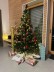 Weihnachtsbaum mit Geschenken Haus Grau